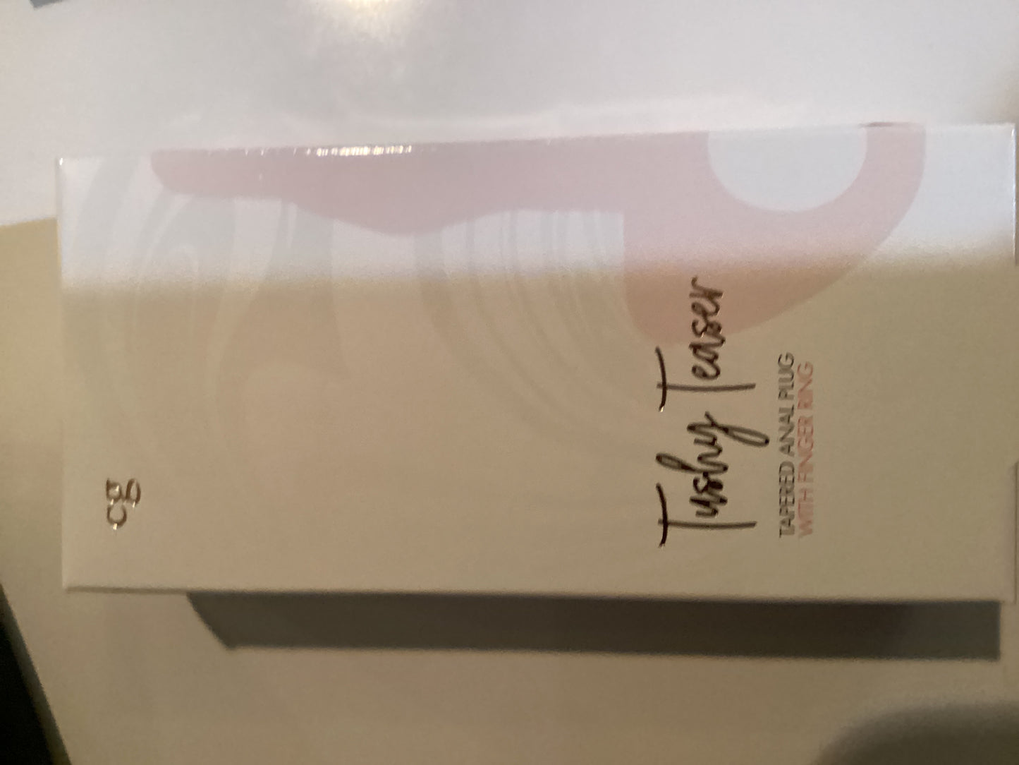 Tushy teaser tapered anal plug with finger ring